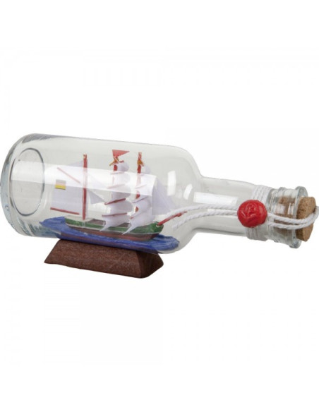 Velero dentro de una botella con base